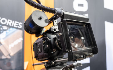 Bright Tangerine Prodigy Rain Deflector Protects Your Lenses